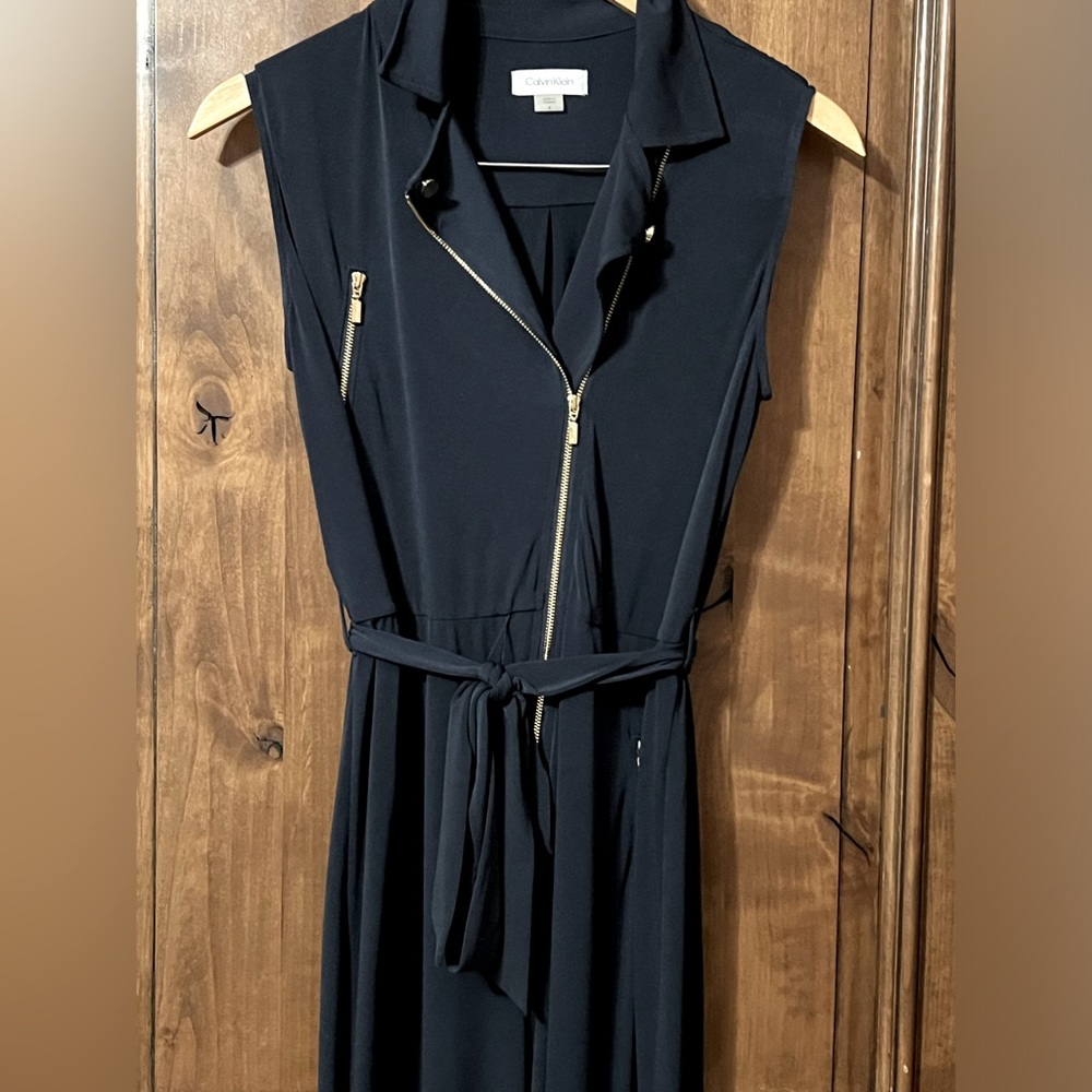 Calvin Klein navy blue with gold accents wide leg jumpsuit. Wore one time